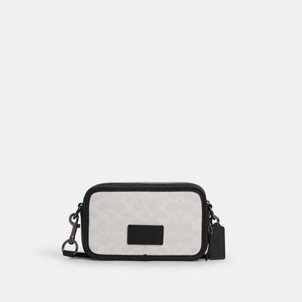 Wyatt Crossbody Bag In Signature Canvas